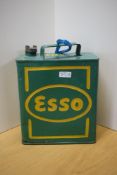 A vintage painted Esso fuel can with brass cap