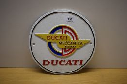 A round painted cast Ducati Mechanica Bolognia wall plaque 24cm