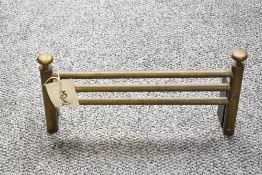 Thought to be early 20th-century brass fireplace grate front, unmarked, approximately 40cm in