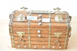 Thought to be 20th-century Reuge Oriental-style wooden musical box, having metal rivets, handles and