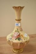 A late 19th to early 20th-century Royal Worcester blush ivory porcelain vase, featuring hand painted