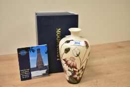A small 20th-century Moorcroft pottery 'Bramble Revisited' decorative vase, designed by Alicia