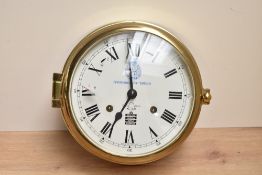 A late 20th-century Sewills of Liverpool Commemorative Edition brass ships bell clock, produced