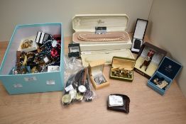 An assortment of costume jewellery and watches, including two cased sets of imitation pearls, a