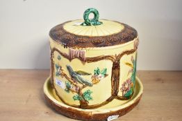 A large Victorian Thomas Forester-style majolica cheese dome, having a twisted vine finial and
