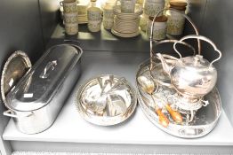 A selection of late 19th to early 20th-century metal and silver-plate tableware, to feature a fish