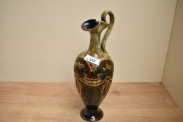 An Art Nouveau Royal Doulton stoneware ewer vase, by E. Violet Hayward (1897-1942), featuring a