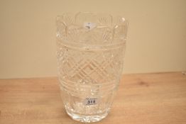 A 20th-century Waterford crystal cut vase, of fluted form, featuring a hand-cut pattern with a heavy