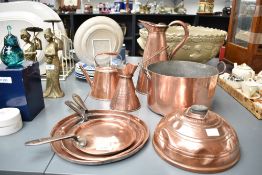 A selection of late 19th-century to early 20th-century copper kitchenware, to feature three