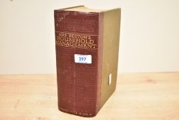 A large early 20th-century cloth bond copy of 'Mrs Beeton's Book of Household Management'