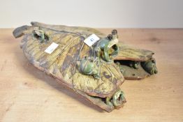 A late 20th-century studio pottery sculpture, featuring several sweetly formed frogs upon a large