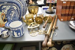 A selection of 19th-century to early 20th-century brass garden and kitchenalia, to include a U.