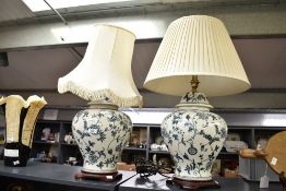 Two 20th-century Chinese-style blue and white lamp bases, of large bulbous ginger-jar form, having
