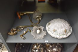 A small selection of late 19th to early 20th-century lights and fixtures, to include an ornate brass