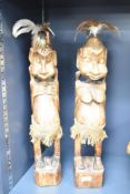 Two thought to be 20th-century Western Africa Tribal Art softwood male and female ancestral figures,