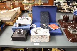 A selection of 20th-century decorative crystalware, to feature a small Swarovski display tulip