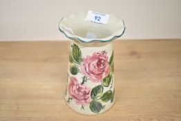 A 19th-century Scottish Wemyss Ware pottery bud vase, having a scalloped edge with delicate pink