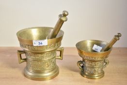 Two Victorian brass apothecary pestles and mortars, each with ornate decoration and of traditional