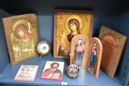 A selection of late 20th-century ecclesiastical plaques, depicting various prints of holy figures