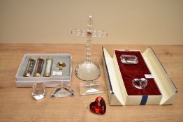 A selection of 20th-century Swarovski crystal society ware, to feature a large decorative cross; set