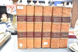 Volumes I to VI of the 19th-century Scott’s Bible, specifically 'The Holy Bible with Explanatory