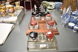 A selection of 20th-century double inkwells, to feature two Bakelite lid examples, one having a