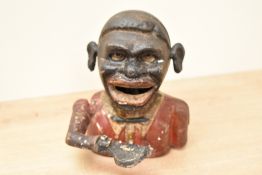 A 20th-century painted cast iron 'Jolly Gent' mechanical money bank, featuring a lever that when