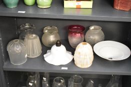 A selection of late 19th to early 20th-century glass light shades, to feature two Art-Deco style