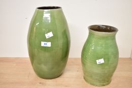 Two 20th-century green Wetheriggs pottery vases, to feature a smaller example presumed to be from