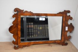 Thought to be 19th-century Georgian-style mahogany wall mirror, featuring scrolled fretwork to the
