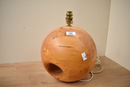 A mid to late 20th-century Swedish-style pine wood table lamp base, featuring a spherical base