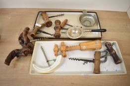 A quantity of 20th-century corkscrews, to feature an animal-tusk and animal-horn handled example;