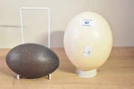 Though to be 20th-century Ostrich and Emu egg shells, both having been blown out by a small hole