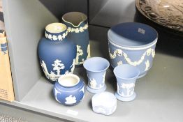 A selection of 20th-century Wedgwood blue Jasperware, to include a jardinier, a pair of small bud