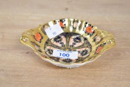 A 20th-century Royal Crown Derby 'Old Imari' bone china twin-handled pedestal pin dish, featuring