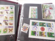 BHUTAN MODERN COLLECTION OF FLAT SETS AND COVERS ETC Couple of albums and flat box of Bhutanese
