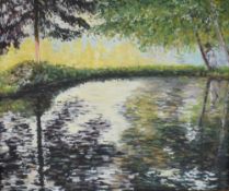 A 20th Century impressionistic oil on canvas , a wooded river scene with figure in golden light,