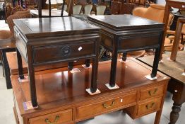 A pair of Oriental hardwood occasional tables in the Chinese style having square tops, approx. 51
