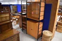 An Ikea 'Niklas' modular shelving unit, similar to Ladderax , comprising shelves, glazed and