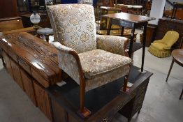 A vintage Parker Knoll armchair, approx. width 66cm