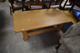 A modern lightwood coffee table , possibly Ercol, approx. 125 x 65cm