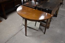 A 19th Century mahogany 'D end' style side table, having line inlay decoration and square tapered