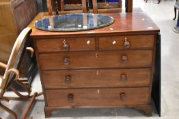 A Victorian mahogany chest of two over three drawers having rosewood turned handles and bracket