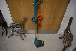 A Bosch electric grass trimmer