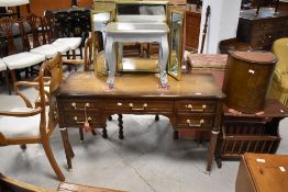 A vintage dressing table and silver stained occasional table