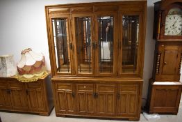 A modern oak wall unit, dimensions approx. W163 H209 D46cm