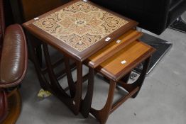 A nest of three vintage G plan occasional tables, in teak , with tile inset to top table, dimensions