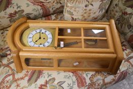 A modern beech effect wall clock, named Hermle, height approx. 68cm