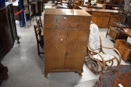 An early to mid 20th Century mahogany and walnut tallboy, height approx. 136cm