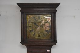 An 18th Century oak longcase clock having eight day movement with brass dial named for William Gunn,